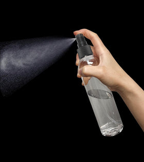ljdeals bottle in hand to show scale and travel-friendly lightweight advantage
