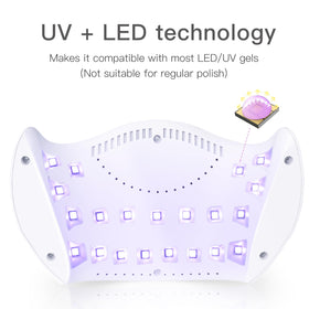 LKE lamp next to a hand to show compact size and easy storage