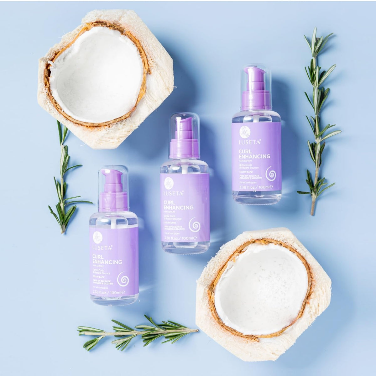 L LUSETA application on damp curls illustrating defined, frizz-reduced curl benefit