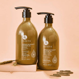 L LUSETA bottles beside castor beans showing natural oil-sourced benefit