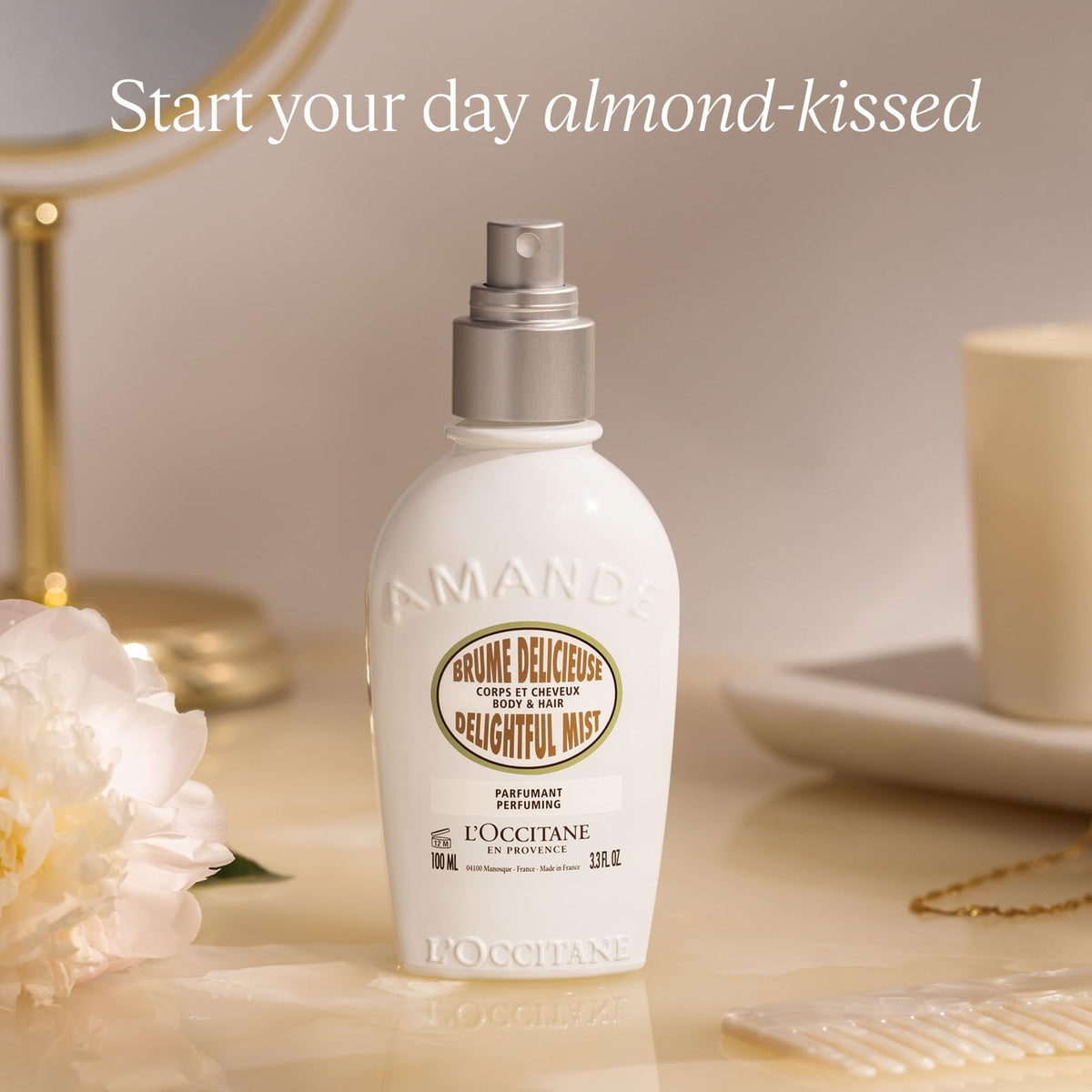 L'OCCITANE mist being applied to hair ends for light scent refresh and softness
