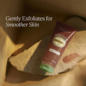 L'Occitane Almond Shower Scrub placed in shower showing daily-use convenience and scent uplift