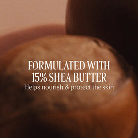 L'OCCITANE cream on hand demonstrating smooth spreadability benefit