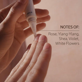 L'Occitane bottle beside manicure tools showing at-home use convenience