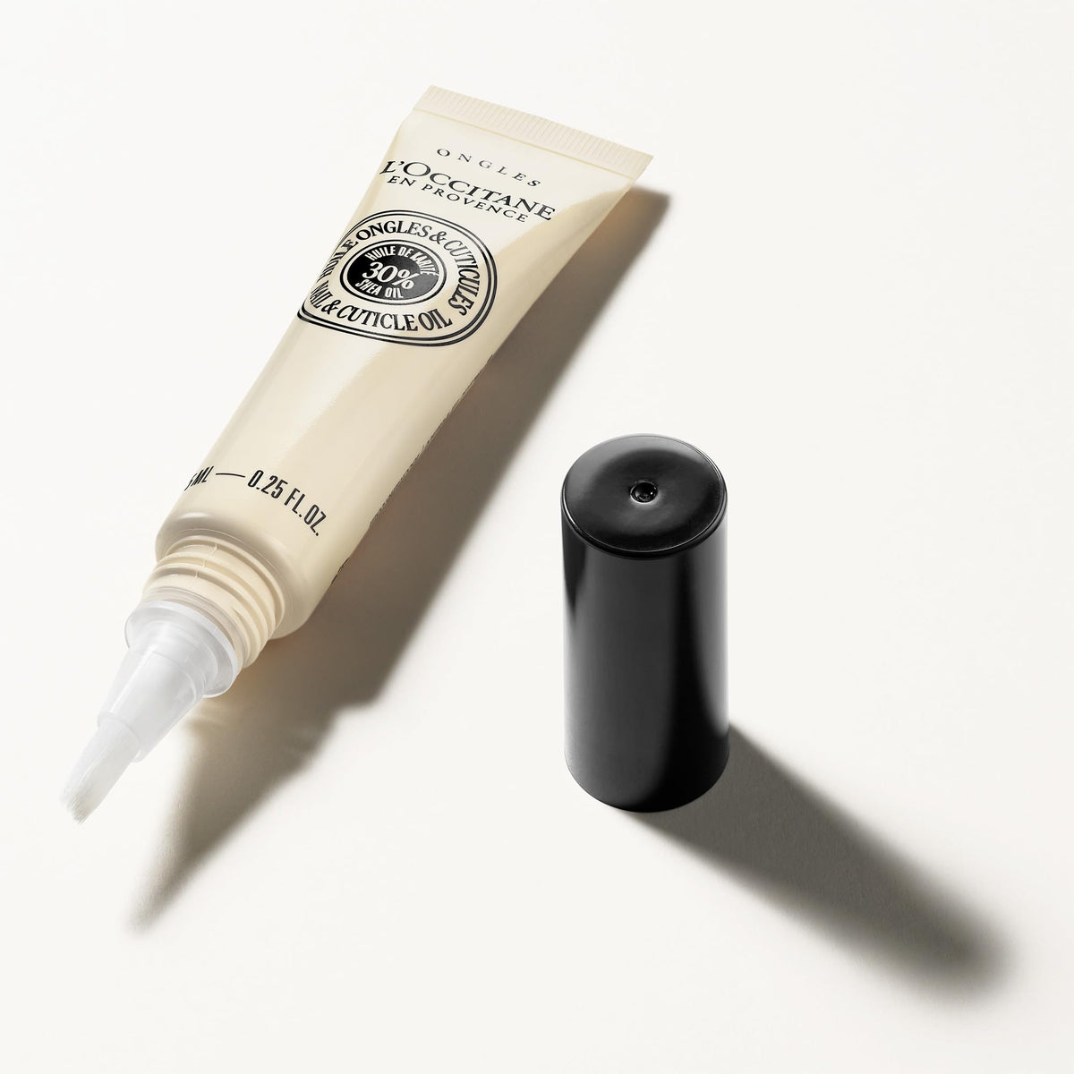 L'Occitane oil drop texture highlighting quick-absorbing finish