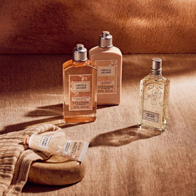 L'OCCITANE shower scene with bottle in a stylish bathroom showing a luxurious experience