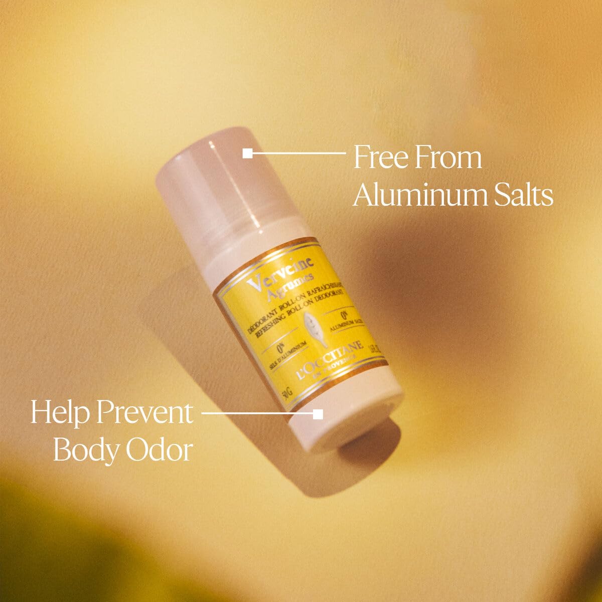 L'OCCITANE roll-on being applied in hand demonstrating quick-dry convenience