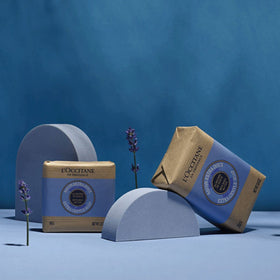 L'OCCITANE soap in hand producing soft foam for gentle, effective cleansing