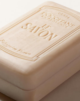 L'OCCITANE lather in hand demonstrating rich foam for effective yet gentle wash
