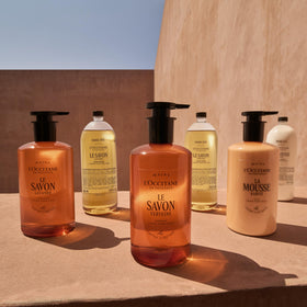 L'OCCITANE bottle on bathroom shelf suggesting everyday ritual and freshness benefit