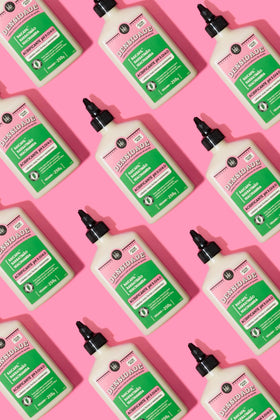Lola product being applied to damp hair in hand to improve strand resistance