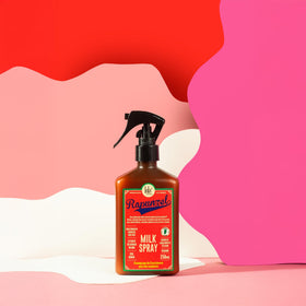 Lola mist spray in hand demonstrating even application and easy detangling benefit