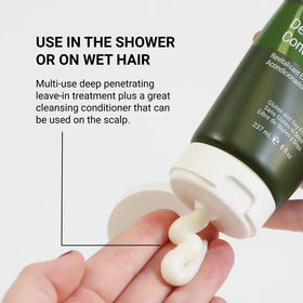LOMA deep conditioner being applied to hair in hand demonstrating easy application benefit