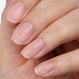 LONDONTOWN brush applying Nail Veil demonstrating easy five-minute mani benefit