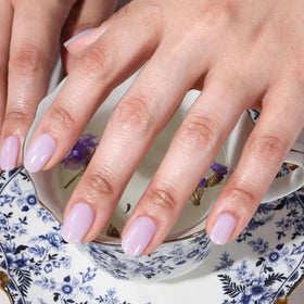 Lifestyle shot of manicure on table illustrating LONDONTOWN Cloud Nine for polished looks