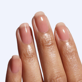 LONDONTOWN cream being applied to nails, showing improved hydration and smoother edges