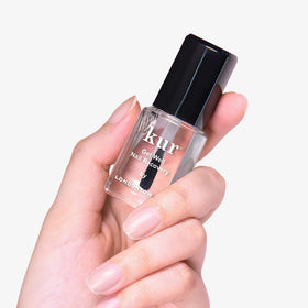 LONDONTOWN ingredient layout featuring AHAs and biotin for targeted nail repair