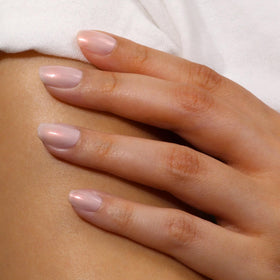 LONDONTOWN polished hands in lifestyle scene showcasing natural flawless nails