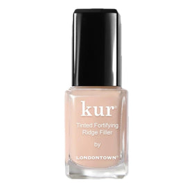 LONDONTOWN bottle front packaging shows apricot-beige tint and benefits