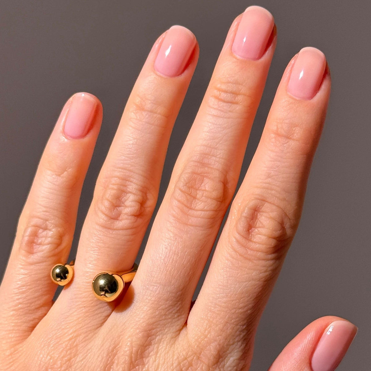 LONDONTOWN nails before and after showing evened tone and improved look benefit