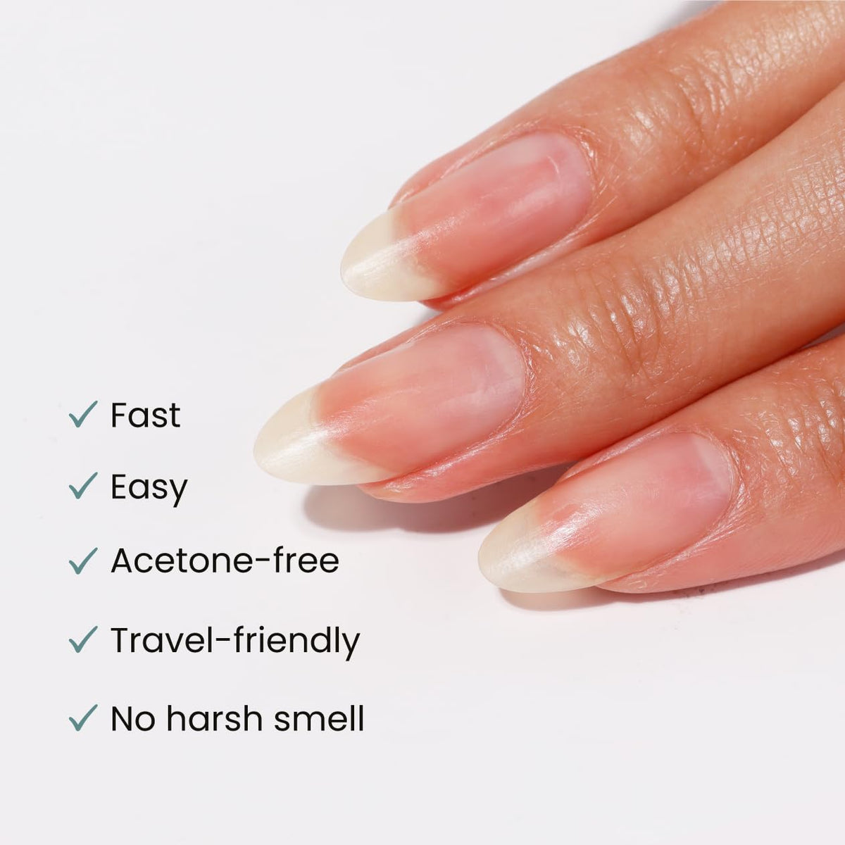 LONDONTOWN pad held in hand illustrating size and one-pad, ten-nail removal benefit