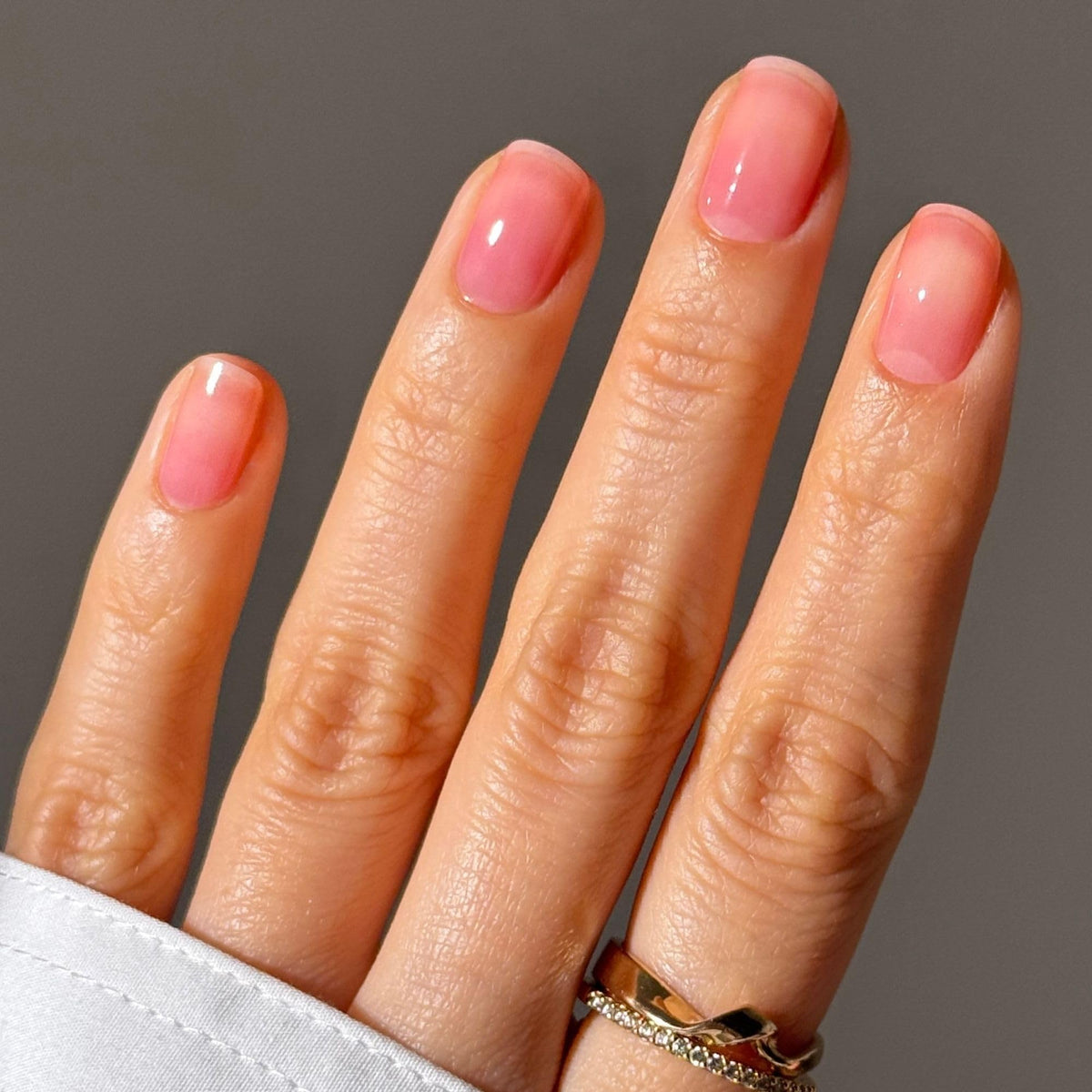 LONDONTOWN swatch on skin displaying true poppy tint and natural benefit