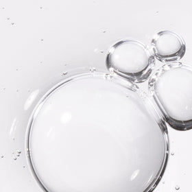 L'Oreal Paris ingredient label detail highlighting exfoliating complex and hyaluronic acid