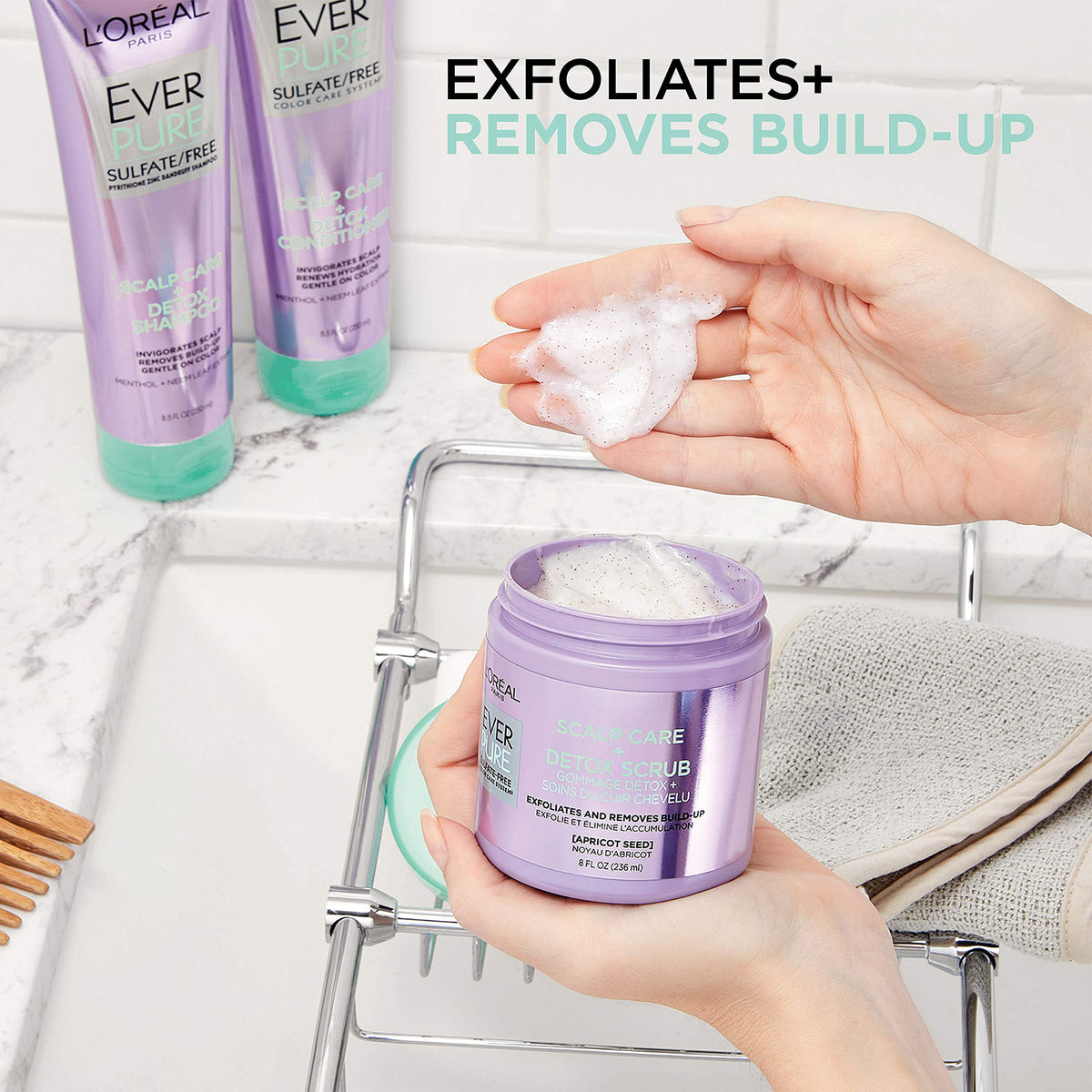 L'Oreal EverPure being massaged into wet scalp for detox and clarity