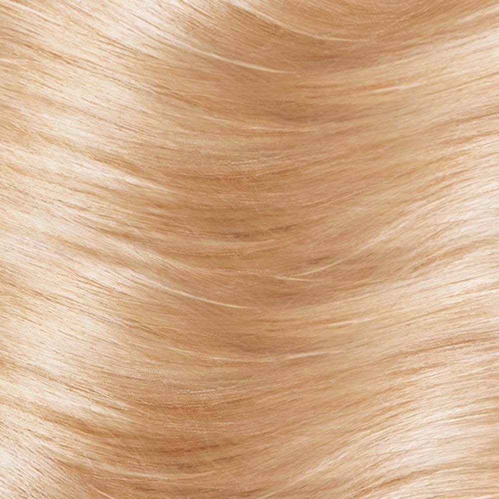 L'Oreal Paris kit contents laid out with colorant, developer and conditioning balm