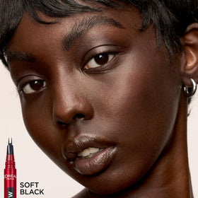 L'Oreal Paris model applying pen in mirror showing quick everyday brow definition