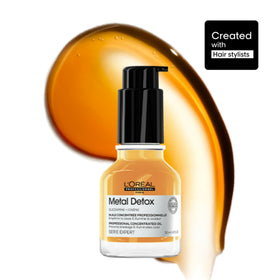 L'Oréal Professionnel pump dispensing oil to demonstrate easy application and measured use