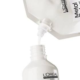 L'Oréal Professionnel Paris shampoo lather on wet hair showing gentle effective cleanse