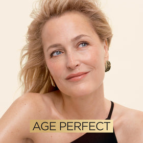 L'Oreal Paris applying cream to face at night to show soothing routine benefit