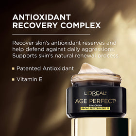 L'Oreal Paris cream being applied to hand showing lightweight feel and fast absorption benefit