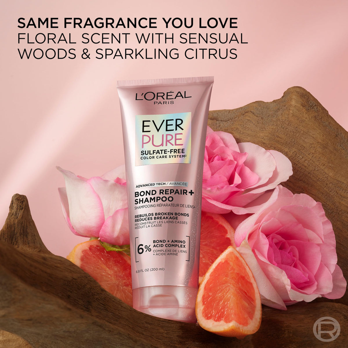 L'Oreal Paris conditioner paired with oil-in-serum illustrating layered repair benefits