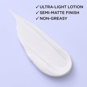 L'Oreal Paris product flatlay with included hyaluronic acid serum sample