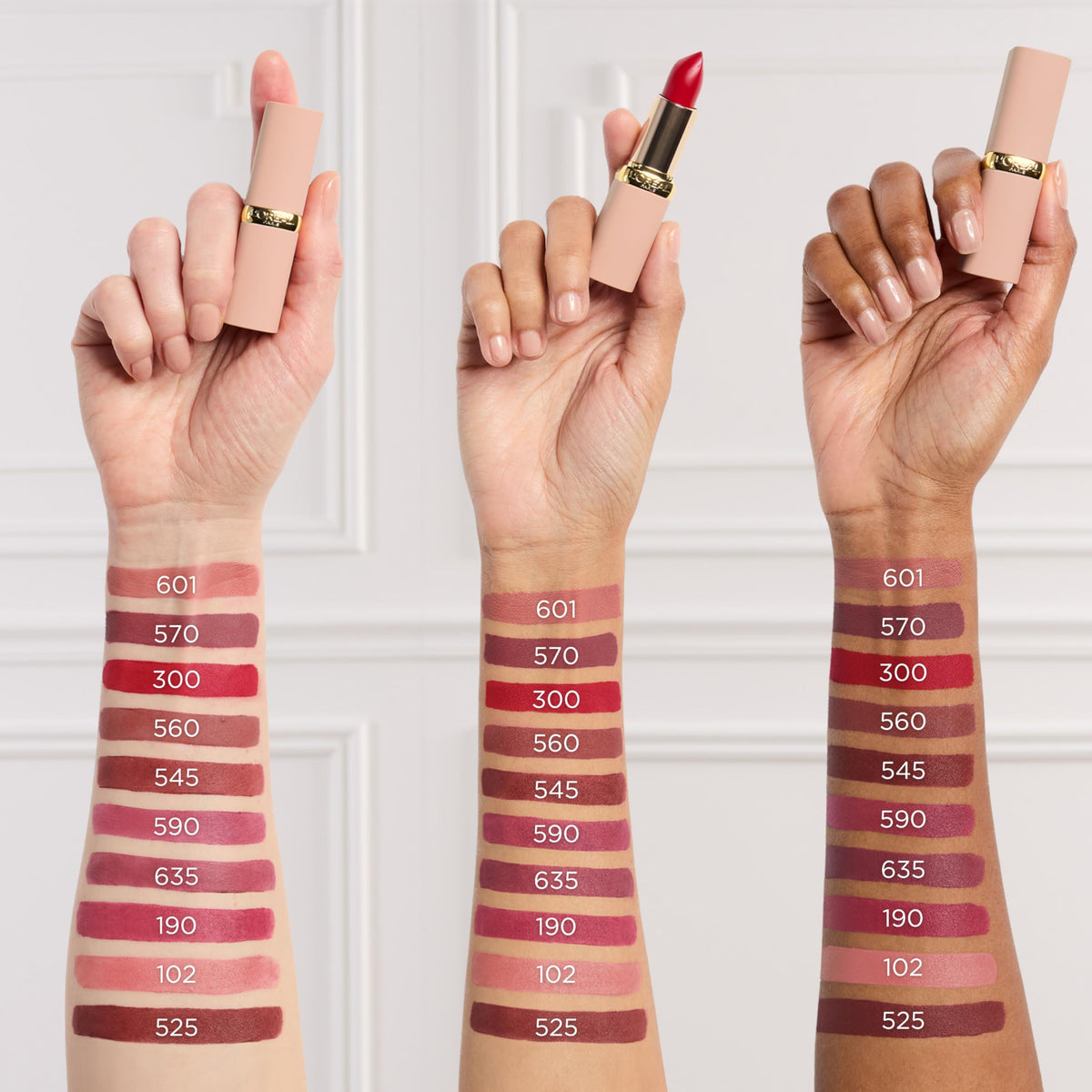 Model wearing L'Oreal Paris blurred matte on lips smiling to show natural finish