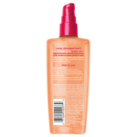 L'Oreal Paris demonstration of iron use after serum for heat protection