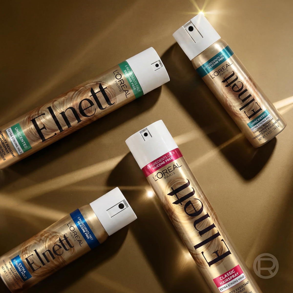 L'Oreal Paris Elnett used by a stylist backstage for secure updo hold