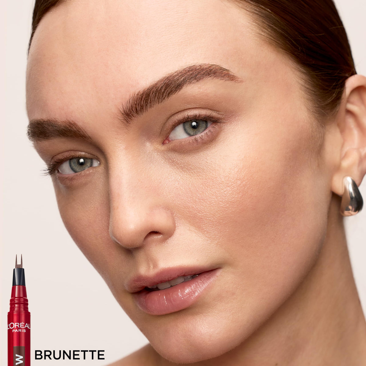 L'Oreal Paris cap and label detail highlighting shade name and product information