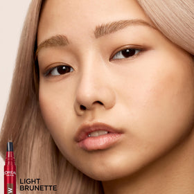 L'Oreal Paris pen inside makeup bag for on-the-go touch-ups