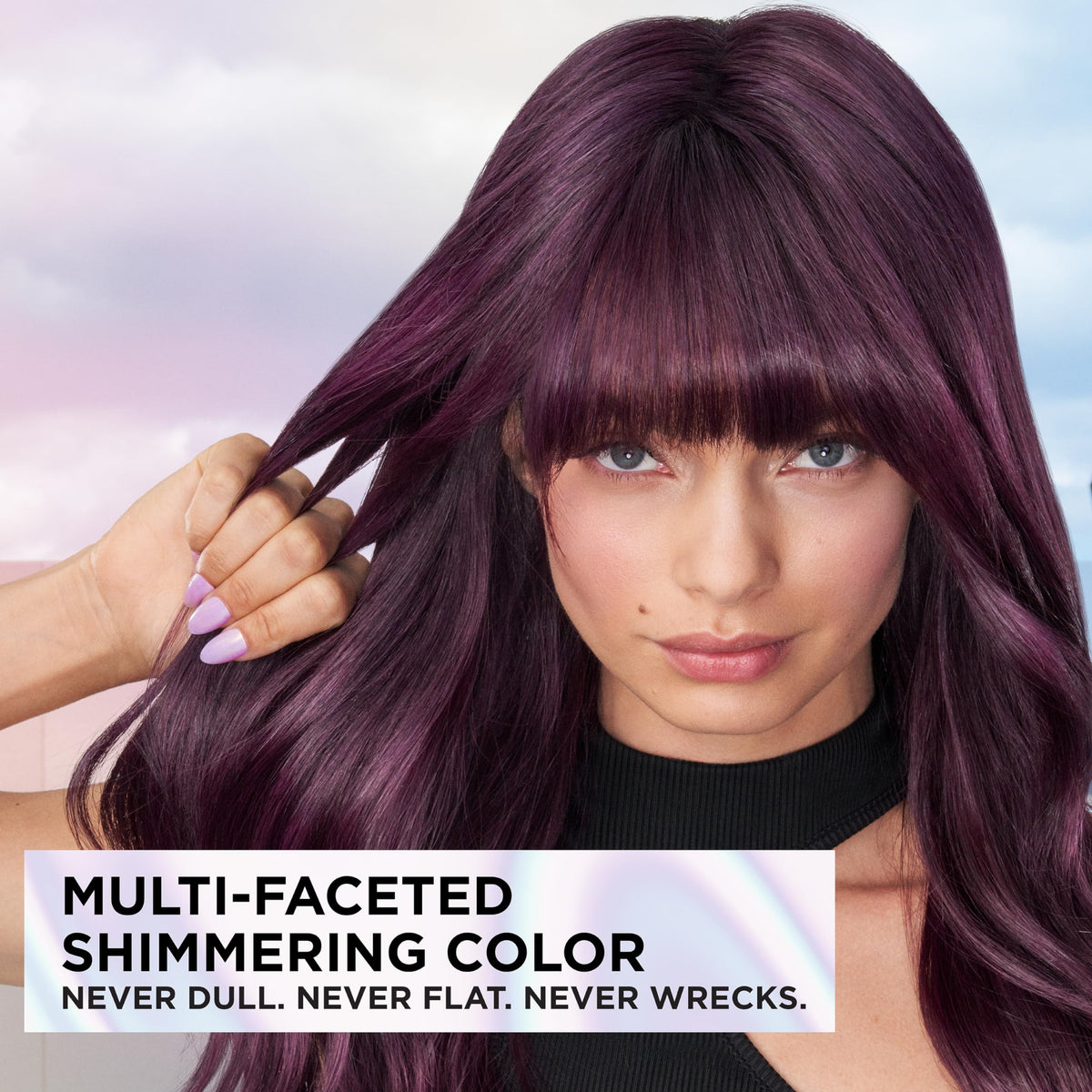 Model with L'Oreal Paris Feria C74 intense copper hair showing dimensional shimmer and reflective highlights