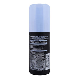 L'Oreal Paris mist landing on skin texture illustrating lightweight finish