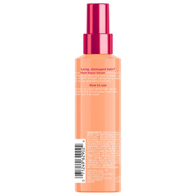 L'Oreal Paris Heat Slayer on bathroom vanity styled for everyday routine ease
