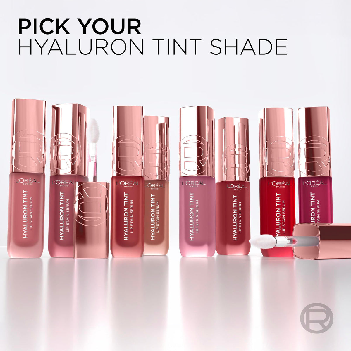Flat lay of L'Oreal Paris hyaluron tint with makeup items showing everyday kit compatibility