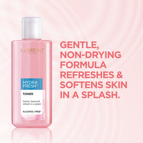L'Oreal Paris close-up of bottle highlighting gentle dispensing and clarity