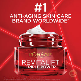 L'Oreal Paris jar beside box packaging indicating updated formula and clear labeling