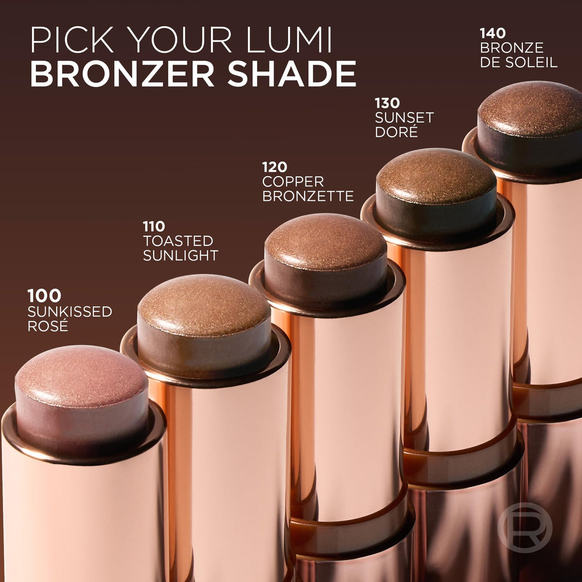 L'Oreal Paris bronzer stick next to a coin to illustrate compact size and travel convenience