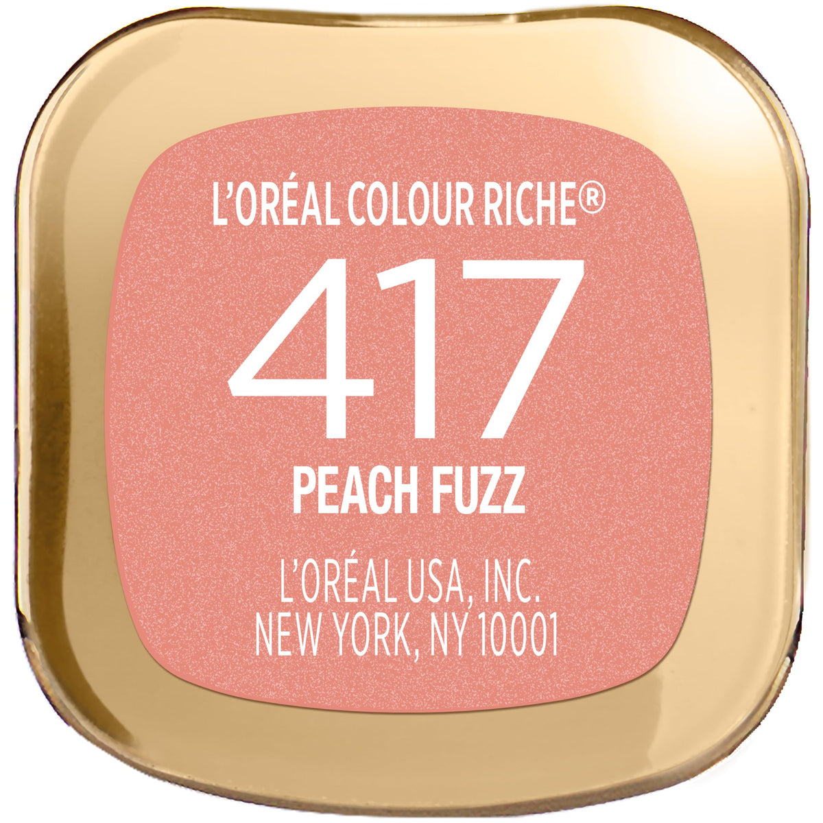L'Oreal Paris lipstick beside a hand to show Peach Fuzz scale and travel-friendly size