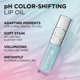L'Oreal Paris lip oil held in hand to show size and portability for on-the-go touch-ups